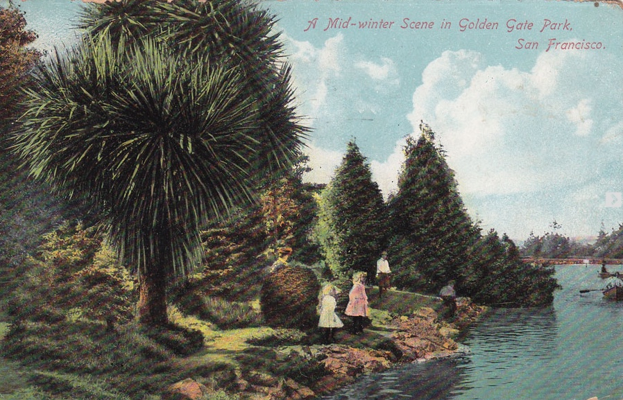 People sitting around the lake, historic image.
